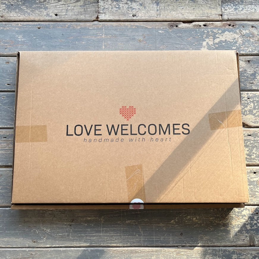 Banksy, Love Welcomes Welcome Mat (2019)