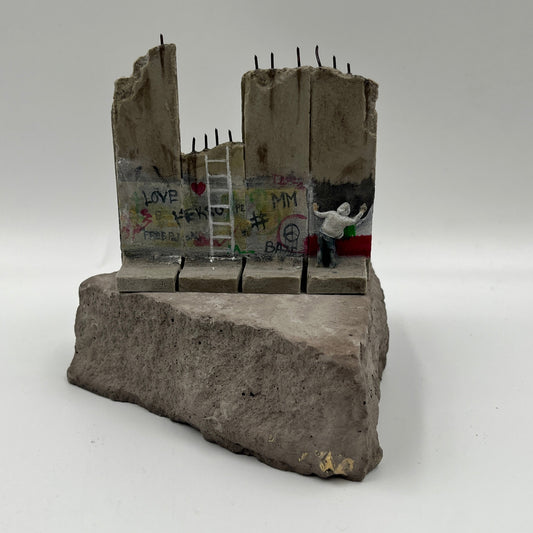 Banksy - Walled Off Hotel Wall Section - Palestine Flag